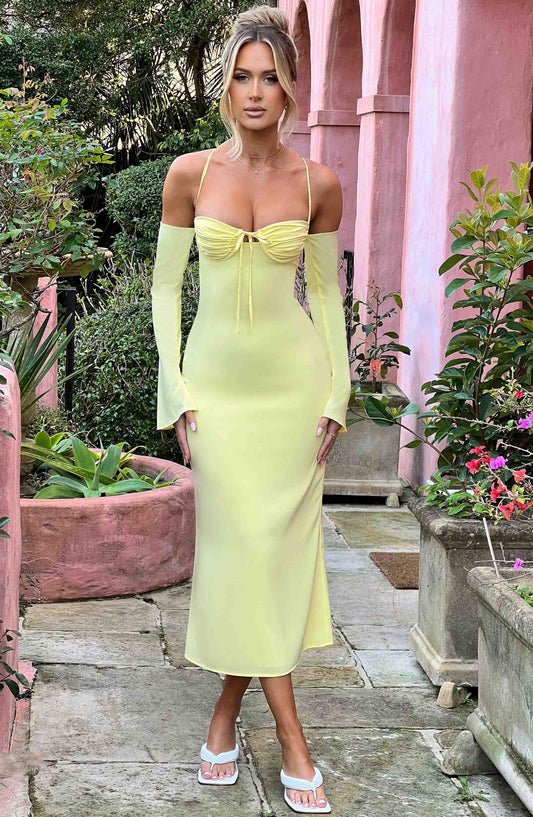 https://cdn.shopify.com/s/files/1/2060/7491/files/dulce-midi-dress-lemon-dress-babyboo-fashion-30950410649663.jpg?v=1748603531