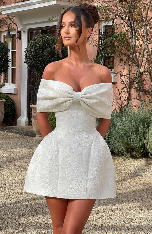 https://cdn.shopify.com/s/files/1/2060/7491/files/raquel-mini-dress-ivory-dress-xs-babyboo-fashion-32087925391423.jpg?v=1748601069