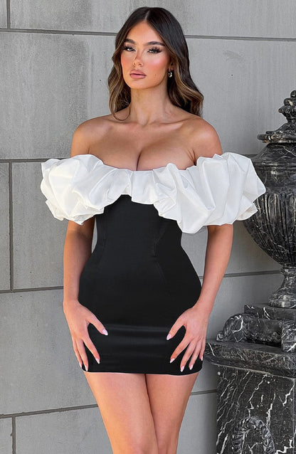 https://cdn.shopify.com/s/files/1/2060/7491/files/allie-mini-dress-black-white-dress-babyboo-fashion-31228896411711.jpg?v=1748602419