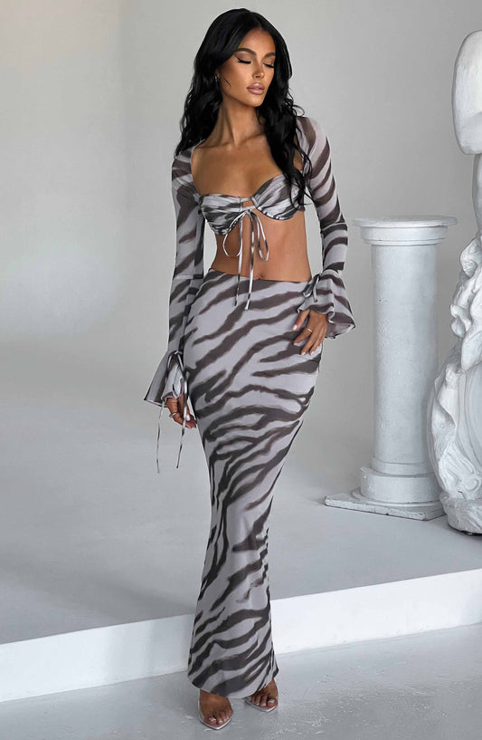 https://cdn.shopify.com/s/files/1/2060/7491/files/astrid-maxi-skirt-zebra-print-skirt-xs-babyboo-fashion-30868977614911.jpg?v=1748604645