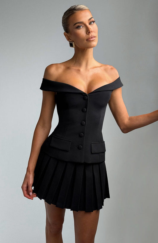 https://cdn.shopify.com/s/files/1/2060/7491/files/blakely-top-black-tops-babyboo-fashion-1112467869.jpg?v=1748600158