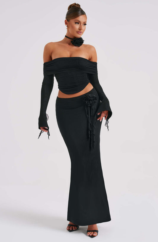 https://cdn.shopify.com/s/files/1/2060/7491/files/deema-maxi-skirt-black-skirt-xs-babyboo-fashion-30906283098175.jpg?v=1748603669