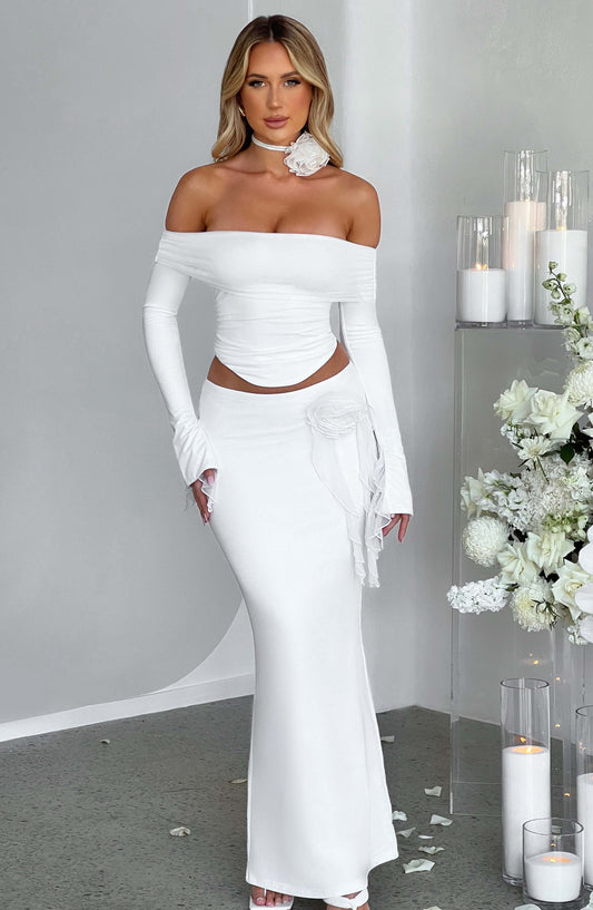 https://cdn.shopify.com/s/files/1/2060/7491/files/deema-maxi-skirt-ivory-skirt-xs-babyboo-fashion-30908626075711.jpg?v=1748603666