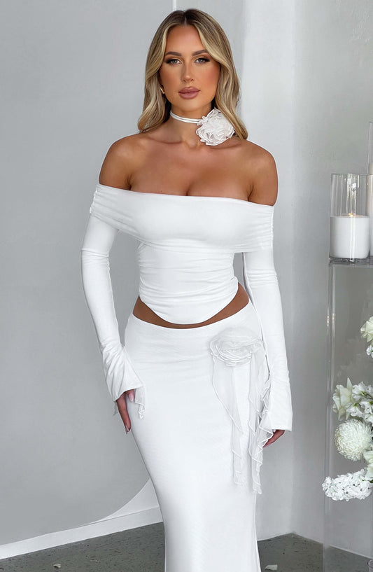 https://cdn.shopify.com/s/files/1/2060/7491/files/deema-top-ivory-tops-xs-babyboo-fashion-30908626042943.jpg?v=1748603673