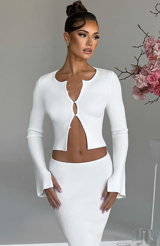 https://cdn.shopify.com/s/files/1/2060/7491/files/elia-top-white-tops-xs-babyboo-fashion-30843654635583.jpg?v=1748604233