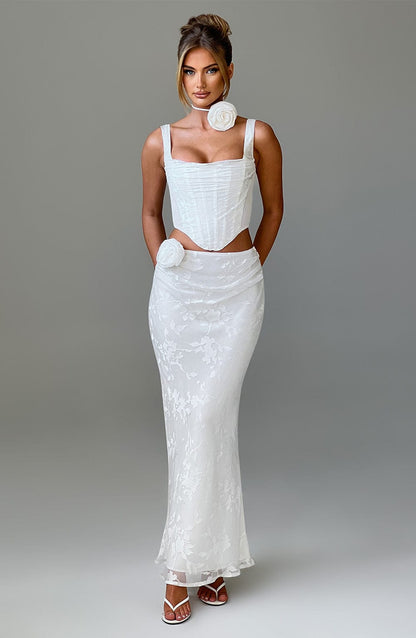 https://cdn.shopify.com/s/files/1/2060/7491/files/elizabeth-maxi-skirt-ivory-skirt-xs-babyboo-fashion-31939604152383.jpg?v=1748601449