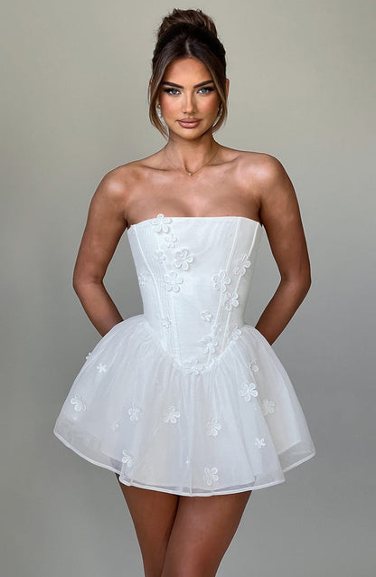 https://cdn.shopify.com/s/files/1/2060/7491/files/justina-playsuit-ivory-playsuit-xs-babyboo-fashion-32087918805055.jpg?v=1748601185