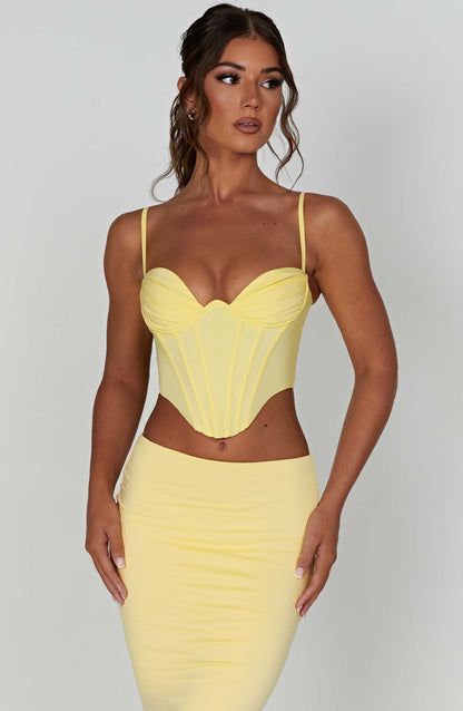 Corsetto alla moda in limone, elegante e femminile