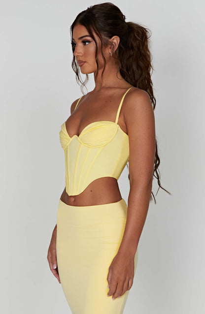 Corsetto alla moda in limone, elegante e femminile