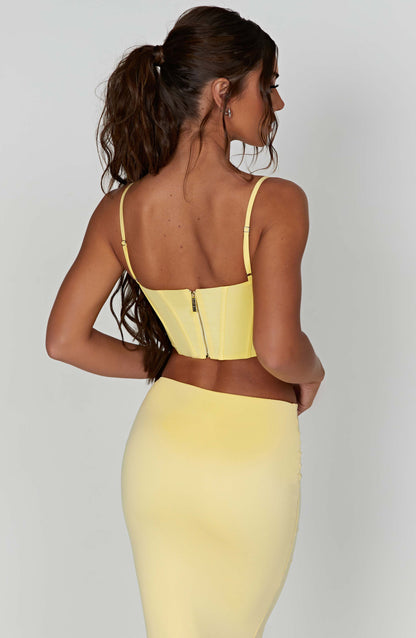 Corsetto alla moda in limone, elegante e femminile