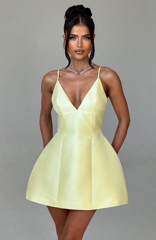 https://cdn.shopify.com/s/files/1/2060/7491/files/nicole-mini-dress-lemon-dress-babyboo-fashion-31741176283199.jpg?v=1748601584