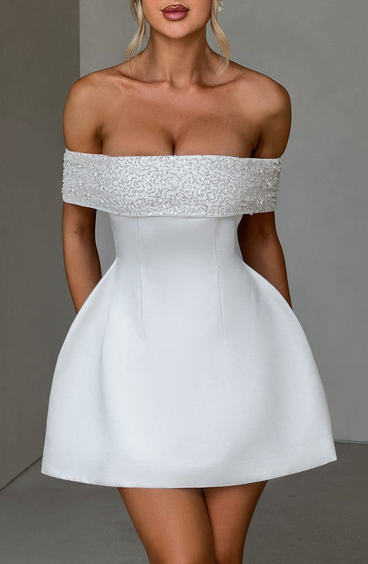 https://cdn.shopify.com/s/files/1/2060/7491/files/noelle-mini-dress-ivory-dress-babyboo-fashion-32522833625151.jpg?v=1748600675