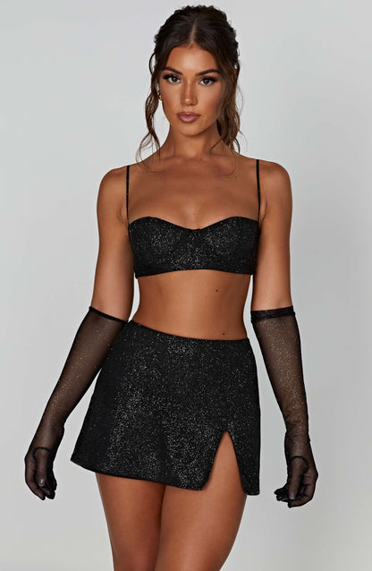 https://cdn.shopify.com/s/files/1/2060/7491/files/posie-mini-skirt-black-sparkle-skirt-xs-babyboo-fashion-30745001361471.jpg?v=1748604816