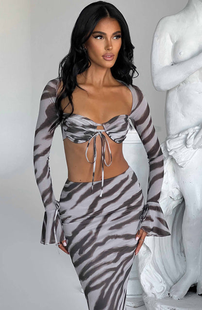 https://cdn.shopify.com/s/files/1/2060/7491/files/priscilla-top-zebra-print-tops-xs-babyboo-fashion-30868986527807.jpg?v=1748604683