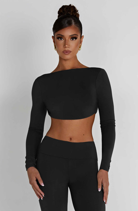 https://cdn.shopify.com/s/files/1/2060/7491/files/sahra-top-black-tops-xs-babyboo-fashion-30855141523519.jpg?v=1748604318