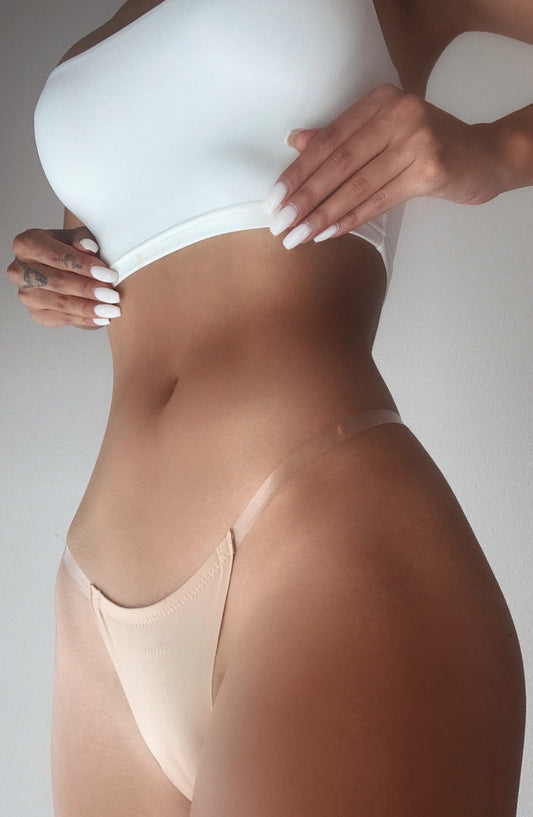 https://cdn.shopify.com/s/files/1/2060/7491/products/seamless-clear-strap-thong-nude-accessories-xs-babyboo-fashion-28127033557055.jpg?v=1748606853