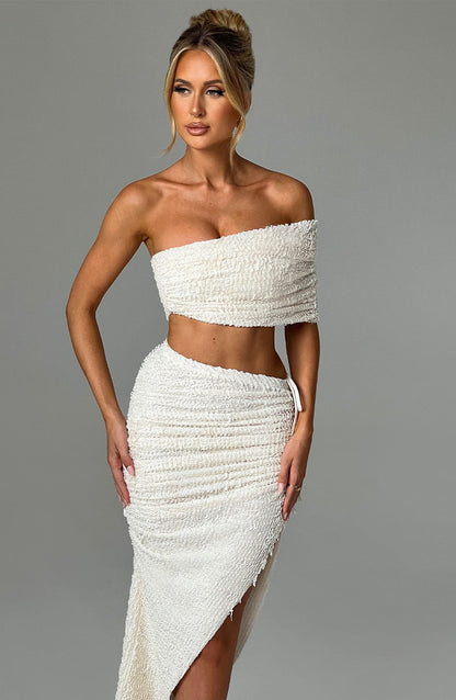https://cdn.shopify.com/s/files/1/2060/7491/files/zina-top-ivory-tops-babyboo-fashion-31294779424831.jpg?v=1748602168